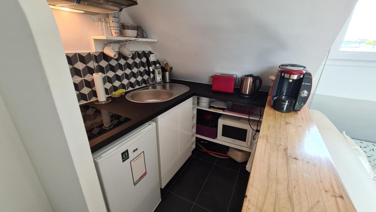 Appartement Coeur De Paris Avec Vue Sur Les Toits Kültér fotó